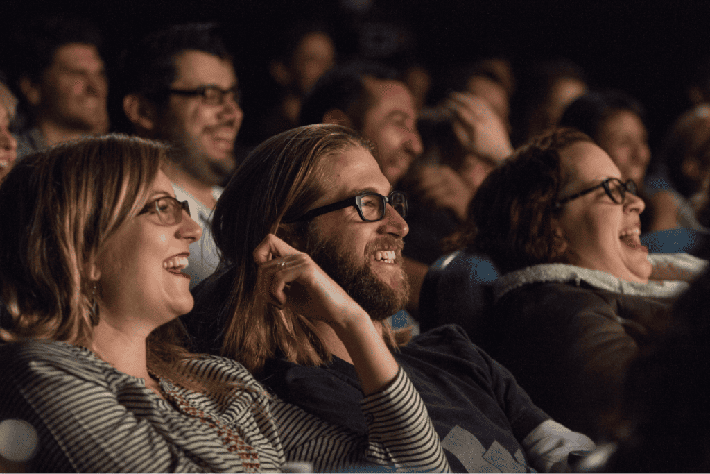 Romantic Things To Do In Indianapolis For Couples : People enjoying a comedy show - Credits: Pinterest