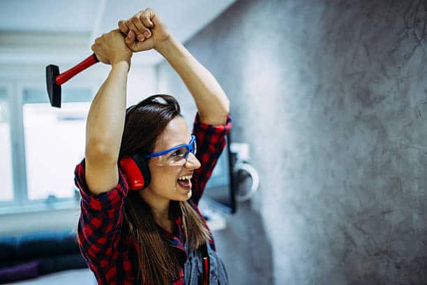 Romantic Things To Do In Richmond For Couples : A lady at a Rage Room - Credits: Instagram