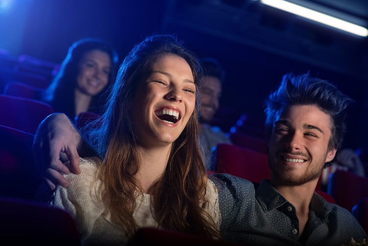 Romantic Things To Do In Minneapolis, Minnesota : Couple at a comedy show - Credits: iStock