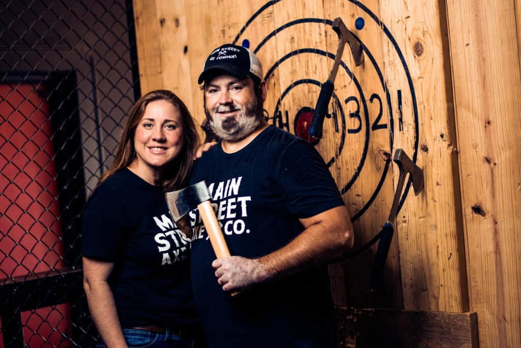 Romantic Things To Do In Hattiesburg, Mississippi : Couple at ax throwing - Credits: Pinterest